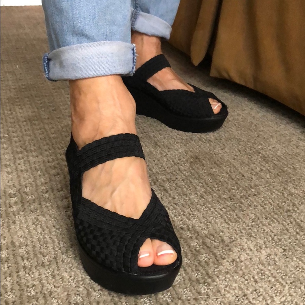 Black Steve Madden woven wedge.